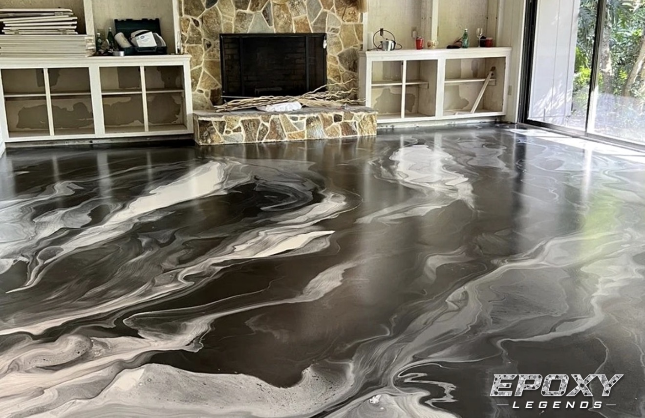 Black and pearl metallic epoxy floor in a Connecticut living room with stone fireplace