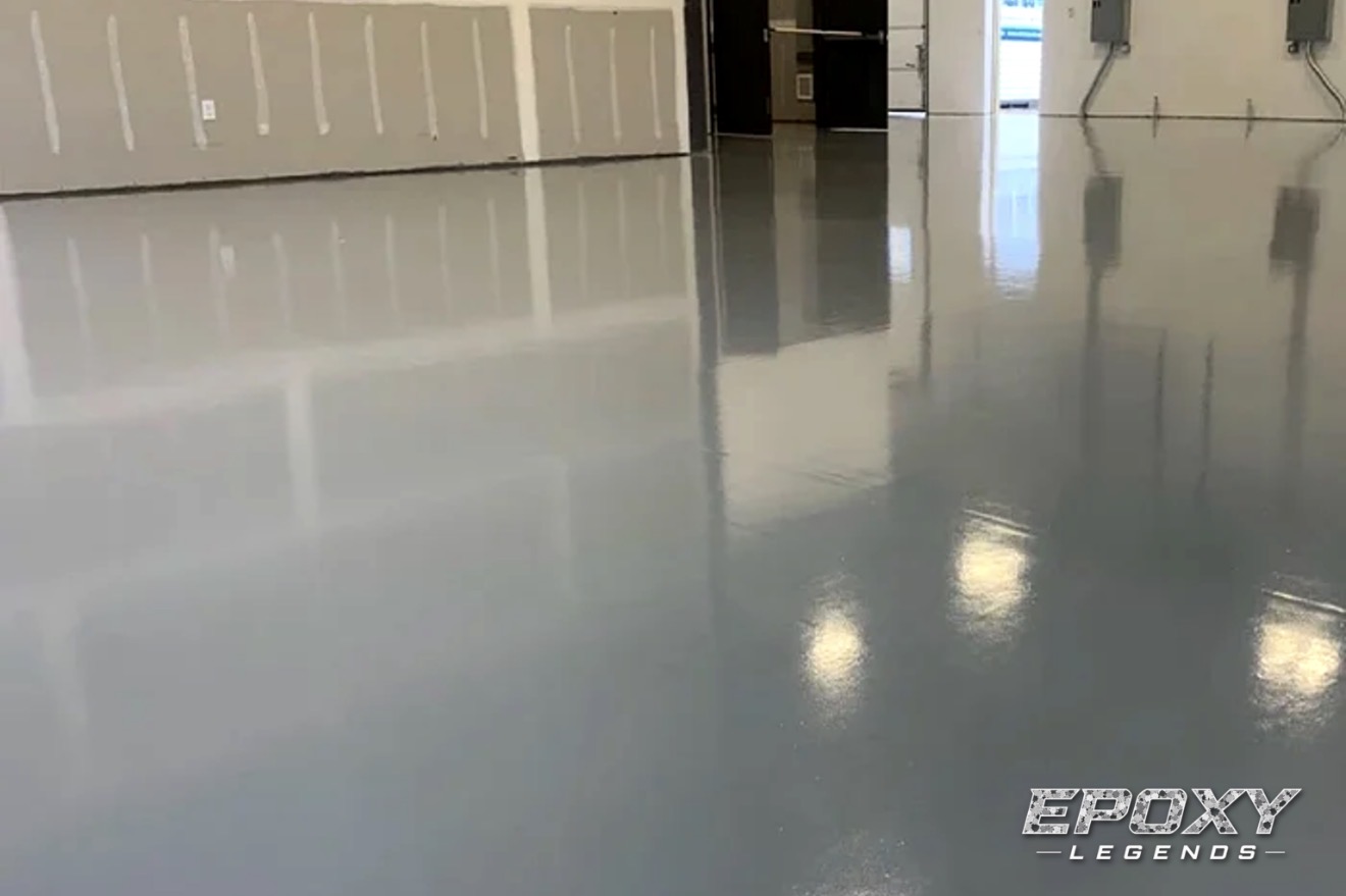 High gloss gray solid color epoxy floor coating in a Connecticut commercial building