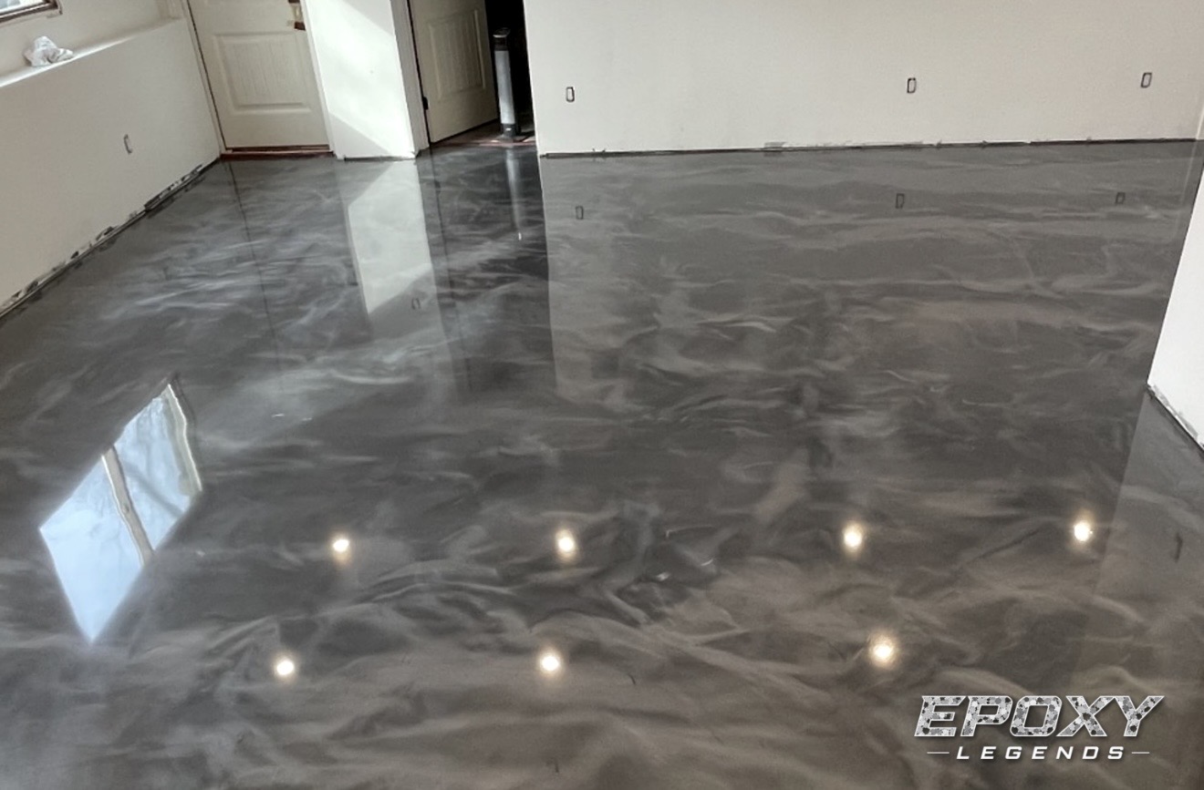 Gray marbled metallic epoxy floor coating in a residential interior room